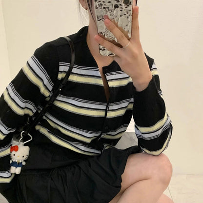 Women's sporty cardigan with fashionable striped pattern and playful buttons NOVAE