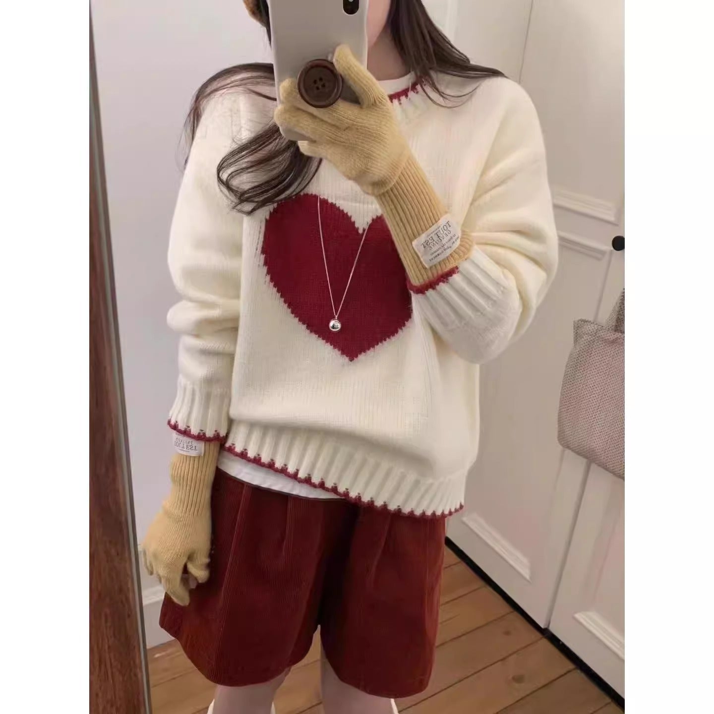 Women's trendy sweater with heart motif and relaxed fit NOVAE