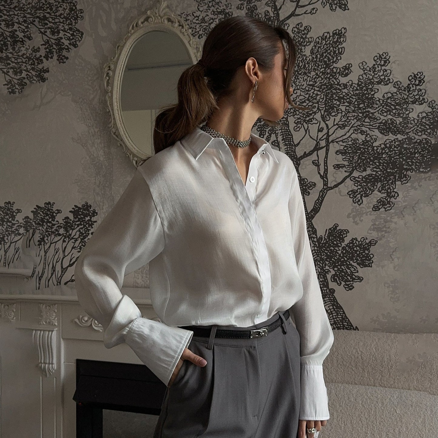 Women's elegant blouse with adjustable cuff design and button details NOVAE