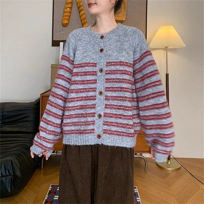 Women's chunky knit cardigan with modern stripes and button details NOVAE
