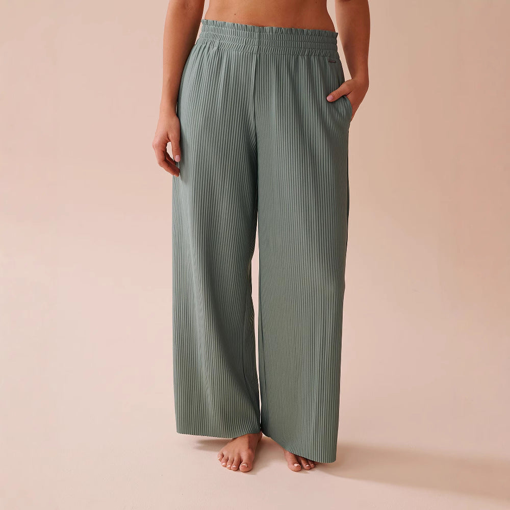 Women's wide-leg pleated trousers with elasticated waistband and side pockets NOVAE