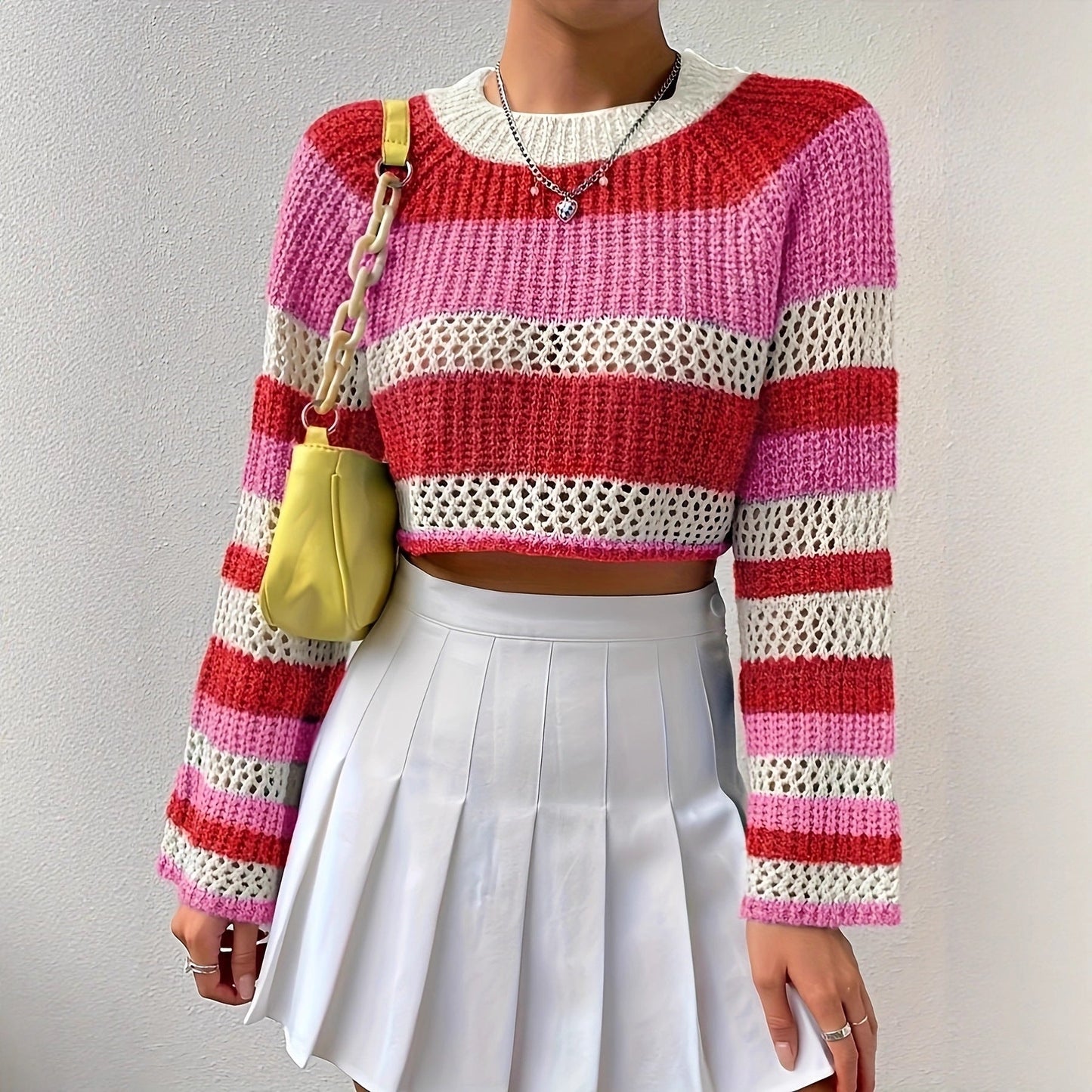 Women's knitted sweater with playful openwork pattern and colorful stripes NOVAE