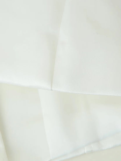 Women's fitted blouse with modern button details and stand-up collar NOVAE