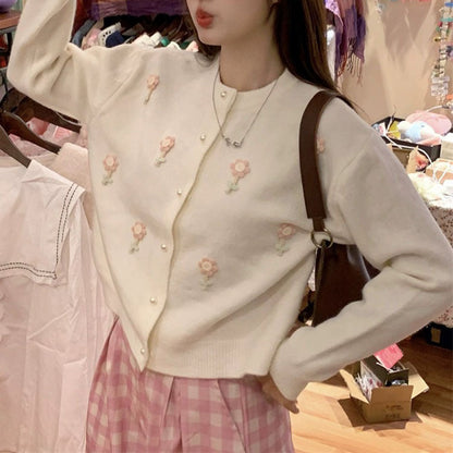 Women's cardigan with artistic floral appliqués and elegant pearl buttons NOVAE