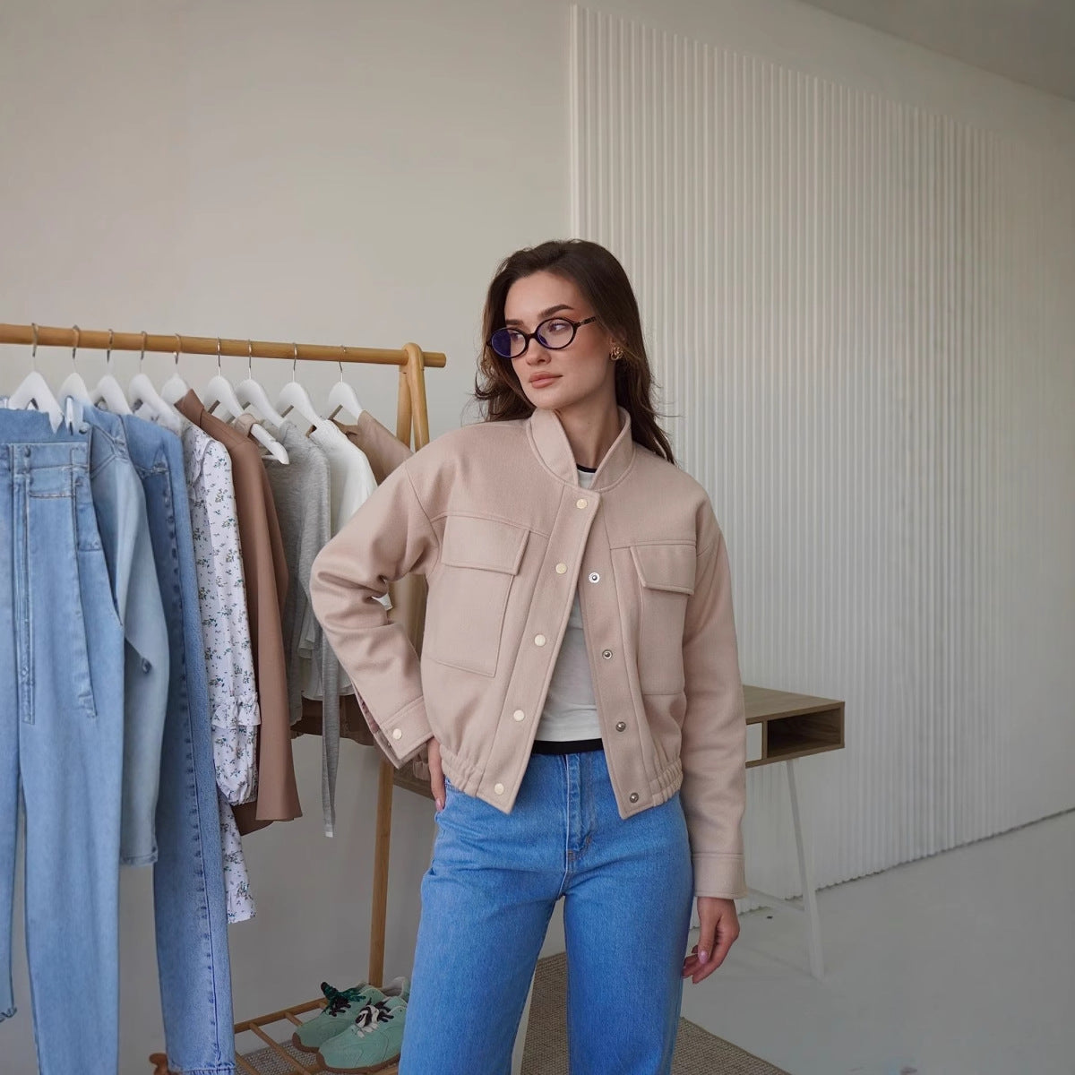 Women's fashionable short jacket with practical pockets and a cool collar NOVAE