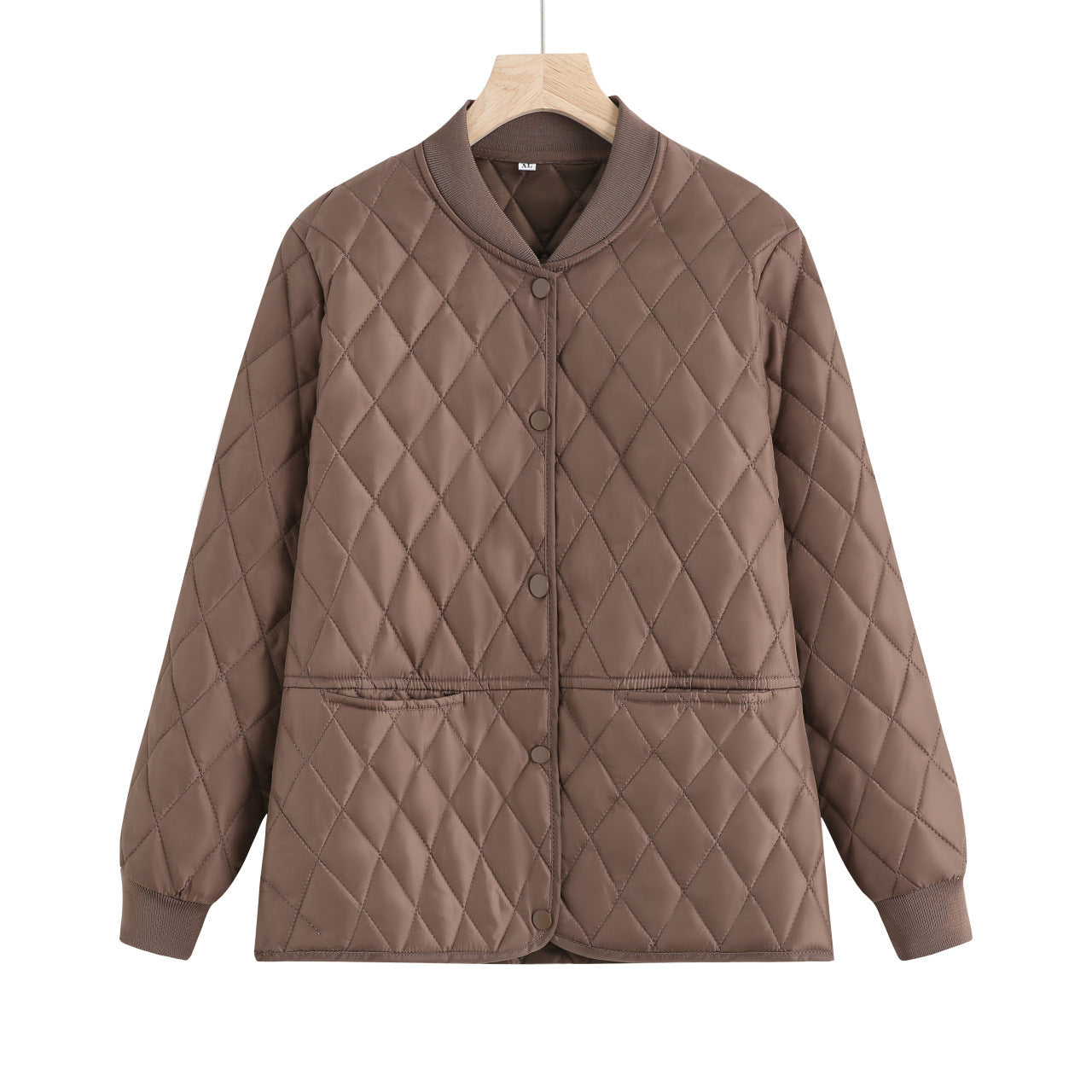 Women's quilted transitional jacket with practical pockets and a modern cut NOVAE