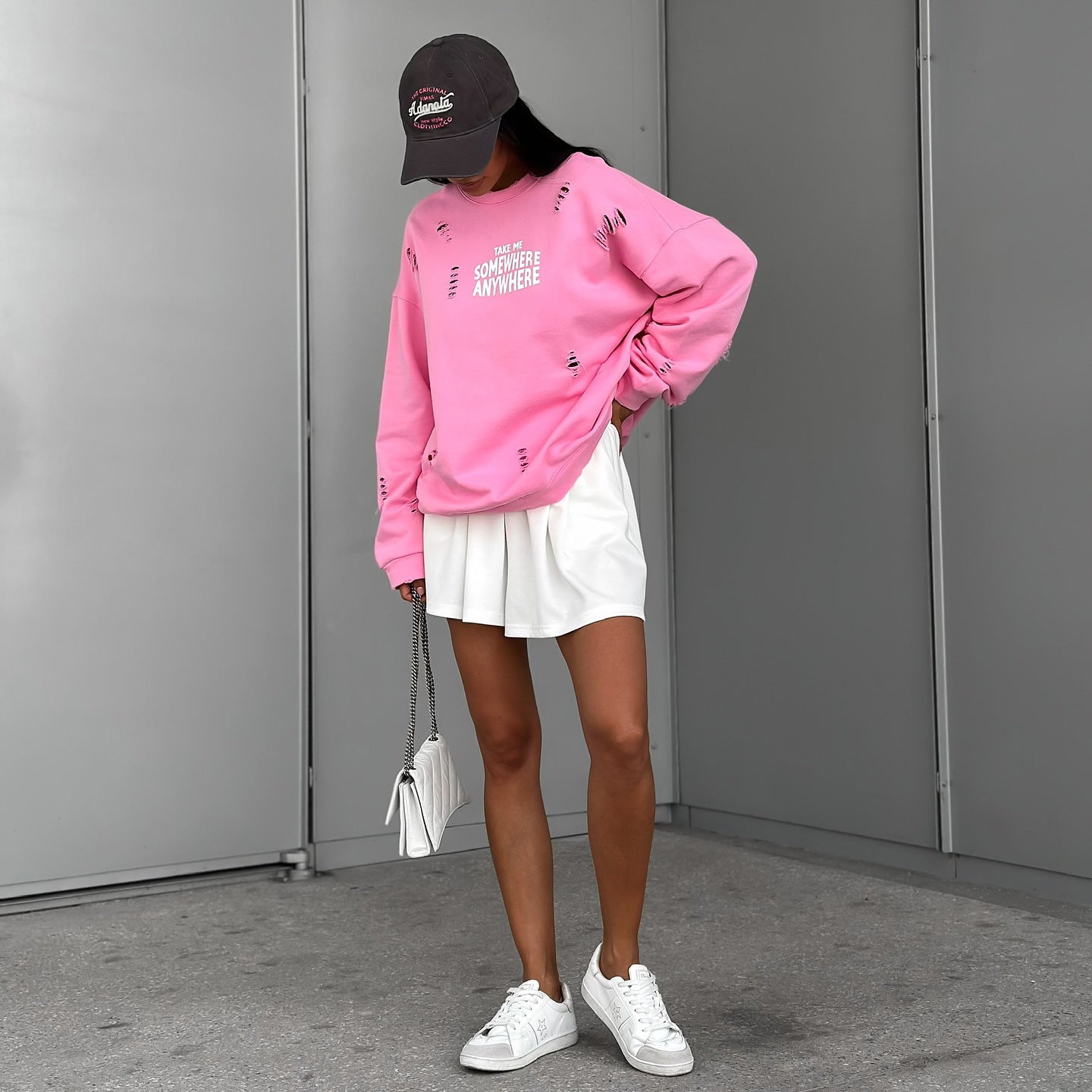 Women's casual oversized sweater with stylish ripped details NOVAE