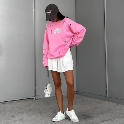 Women's casual oversized sweater with stylish ripped details NOVAE