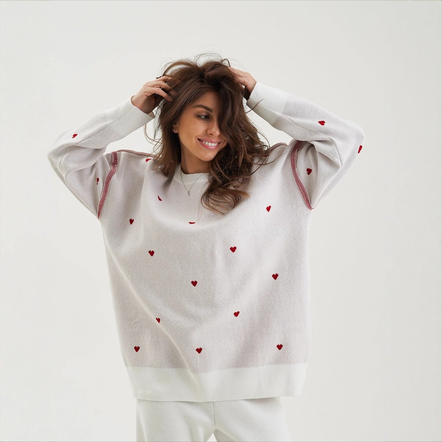 Women's sweater with heart embroidery and a relaxed fit NOVAE