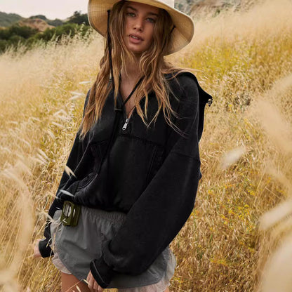 Women's sporty hoodie with half zipper and functional pockets NOVAE