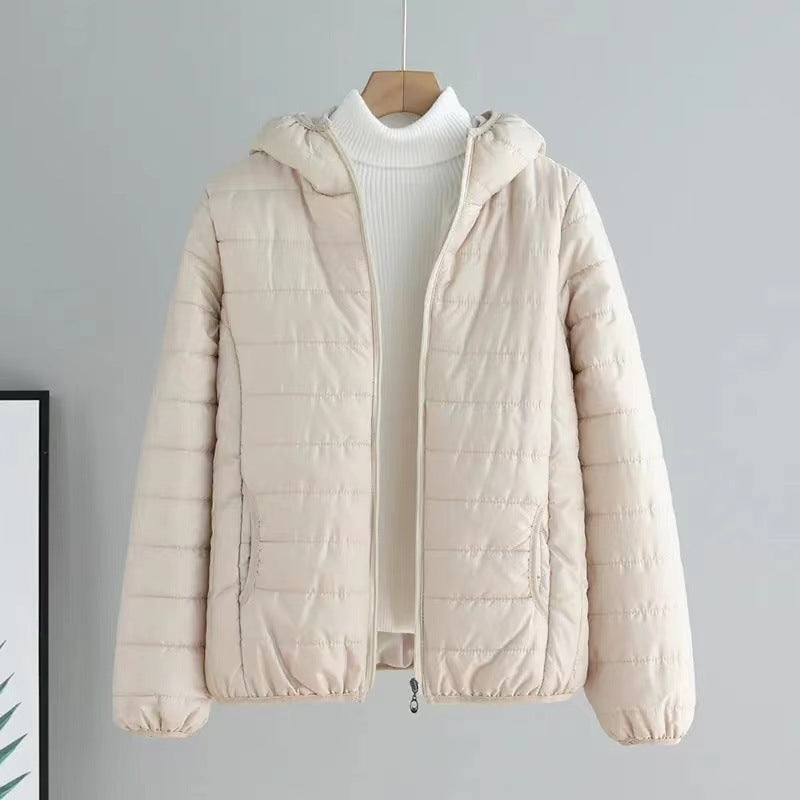 Women's quilted transitional jacket with practical pockets and hood NOVAE