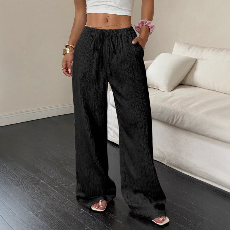 Women's casual and wide-legged leisure trousers with elasticated waistband and tie belt NOVAE