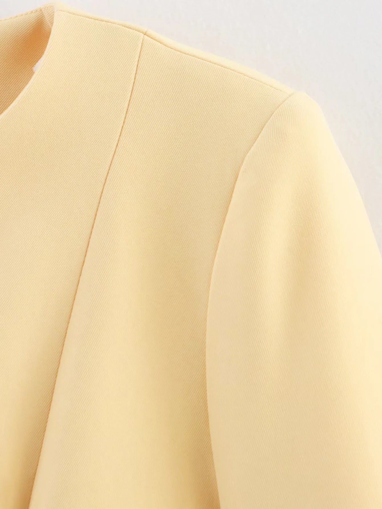 Women's elegant blazer jacket with fine button details and practical pockets NOVAE