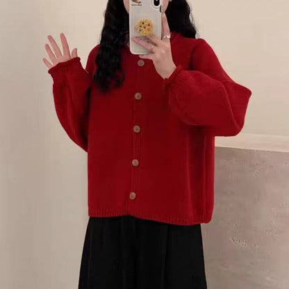 Women's cardigan with asymmetrical cut and generous balloon sleeves NOVAE