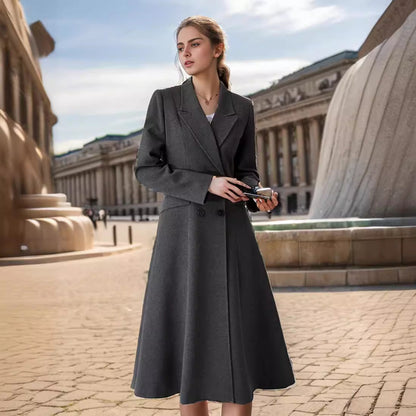 Women's elegant maxi coat with double-breasted button closure and wide, flowing skirt NOVAE