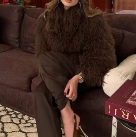 Women's fluffy faux fur jacket in a long cut with wide flared sleeves NOVAE