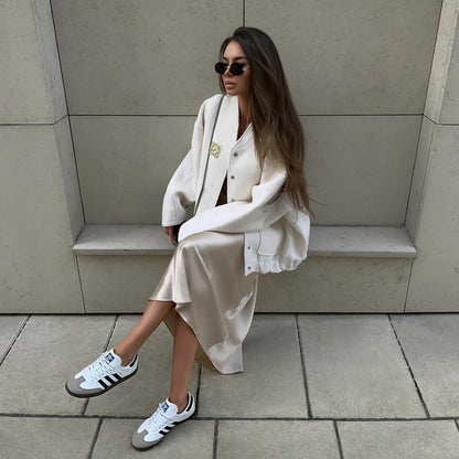 Women's sporty oversized jacket with elegant button details and a casual cut NOVAE