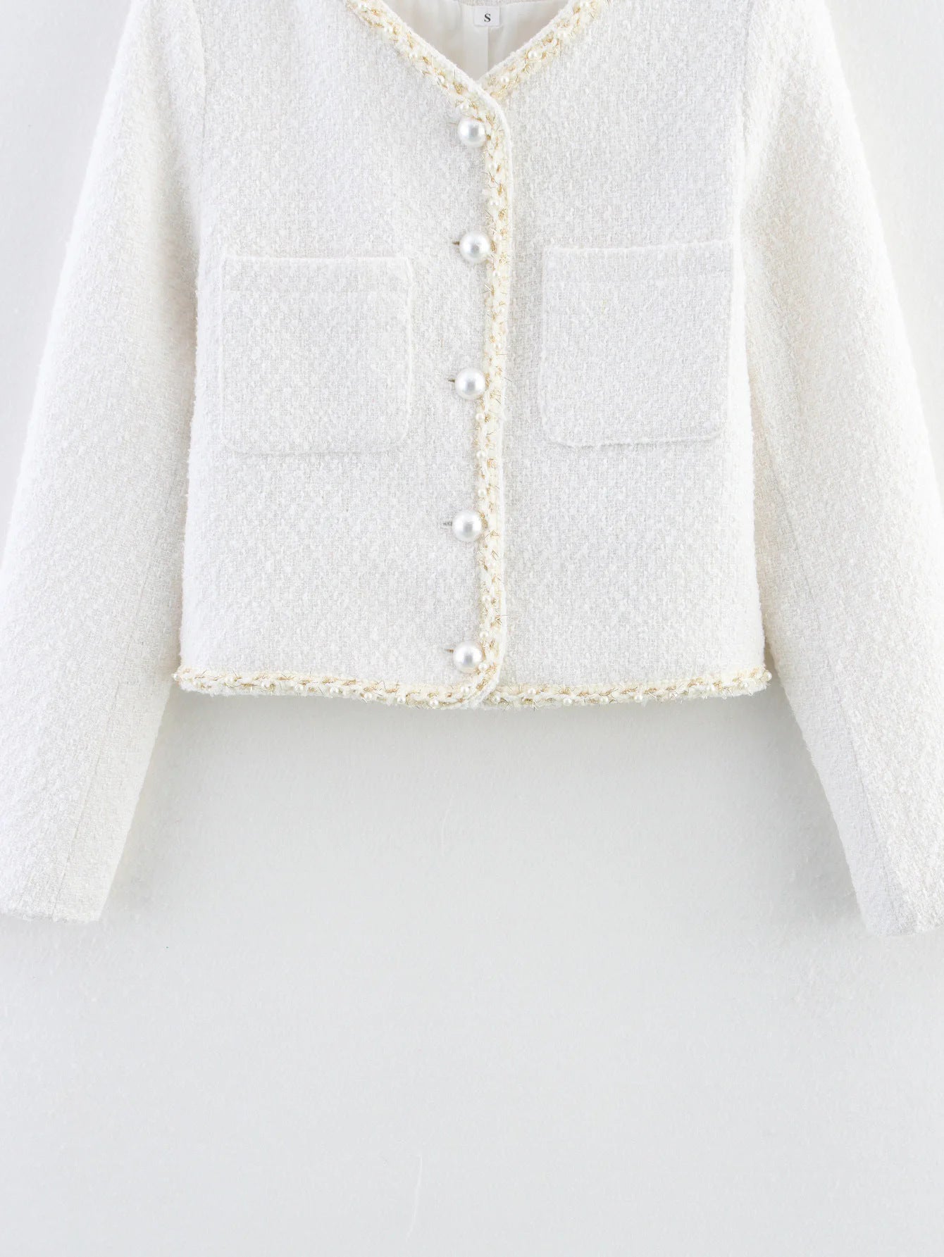 Women's elegant short-sleeved pullover jacket with pearl-decorated buttons and patch pockets NOVAE