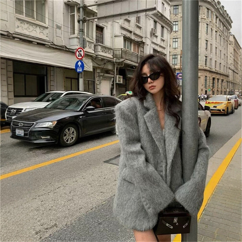 Women's elegant blazer jacket with soft fur and decorative button details NOVAE