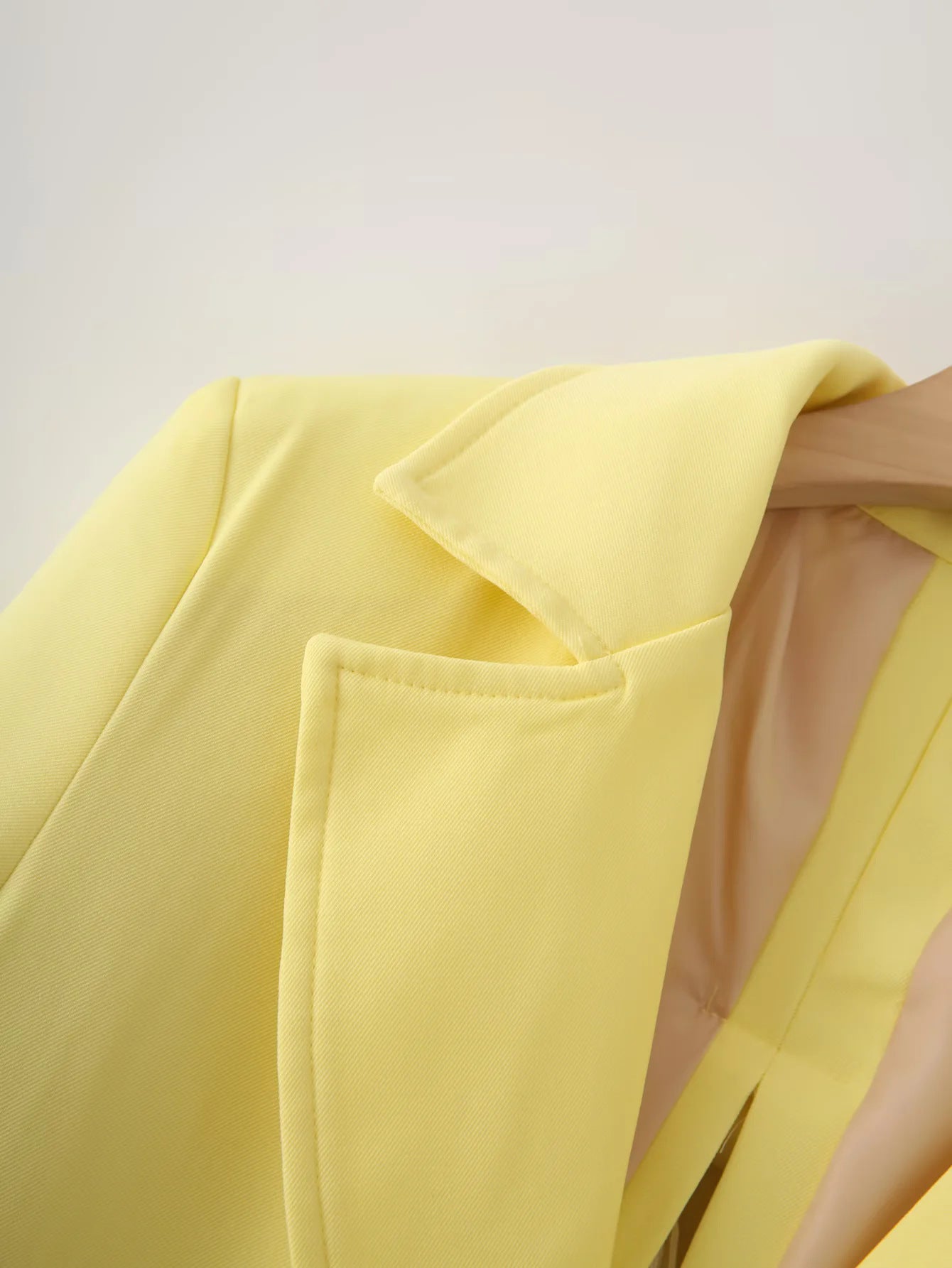 Women's blazer jacket with an elegant cut and practical pockets NOVAE