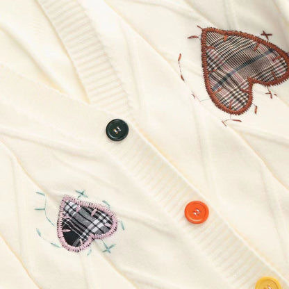 Women's cardigan with heart appliqués and button detailing NOVAE