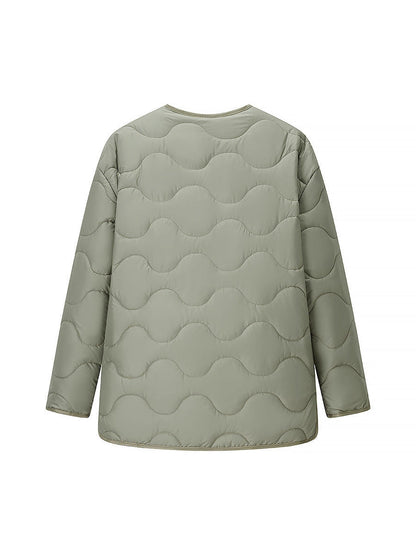 Women's quilted transitional jacket with soft fabric texture and practical snap fasteners NOVAE