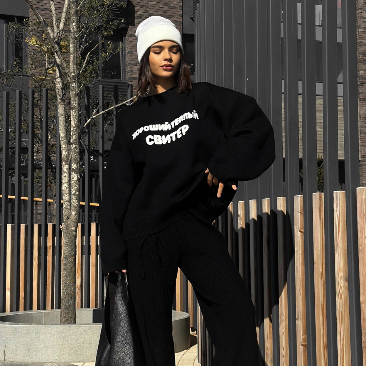 Women's casual oversized sweater with creative lettering and comfortable cut NOVAE