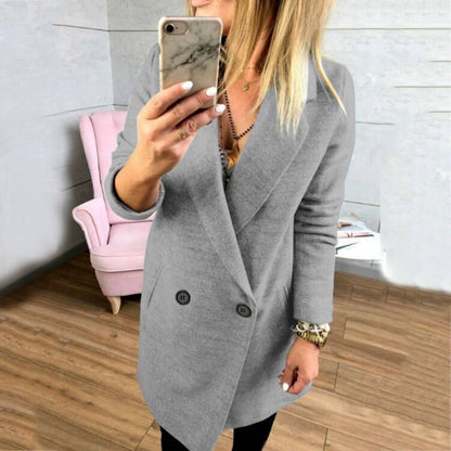 Women's extra-long, tailored coat with elegant lapels and practical pockets NOVAE