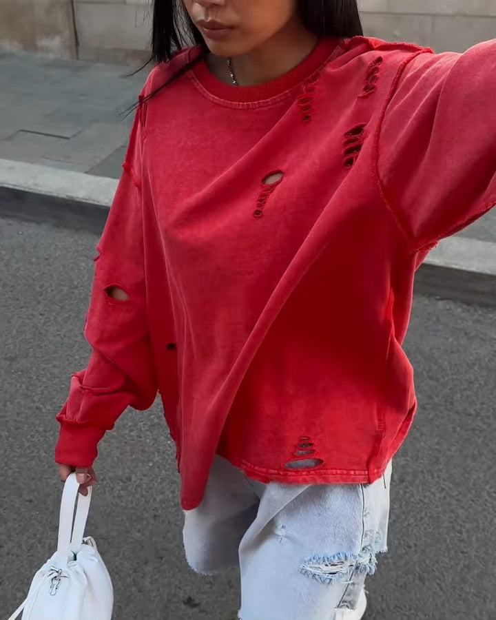 Women's casual oversized sweater with creative ripped details NOVAE