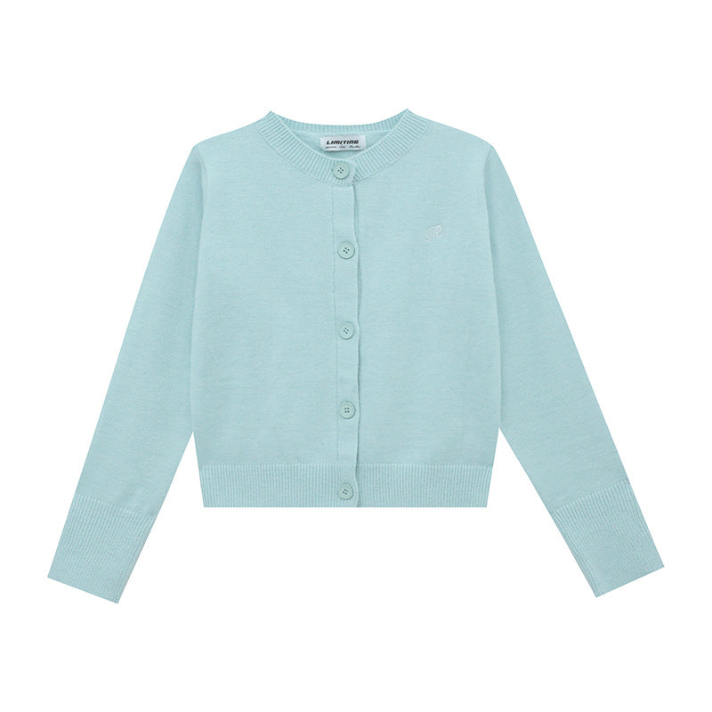 Women's cardigan with fine rib pattern and contrasting button details NOVAE