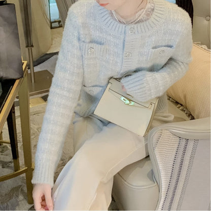 Women's cardigan with pockets and decorative buttons NOVAE