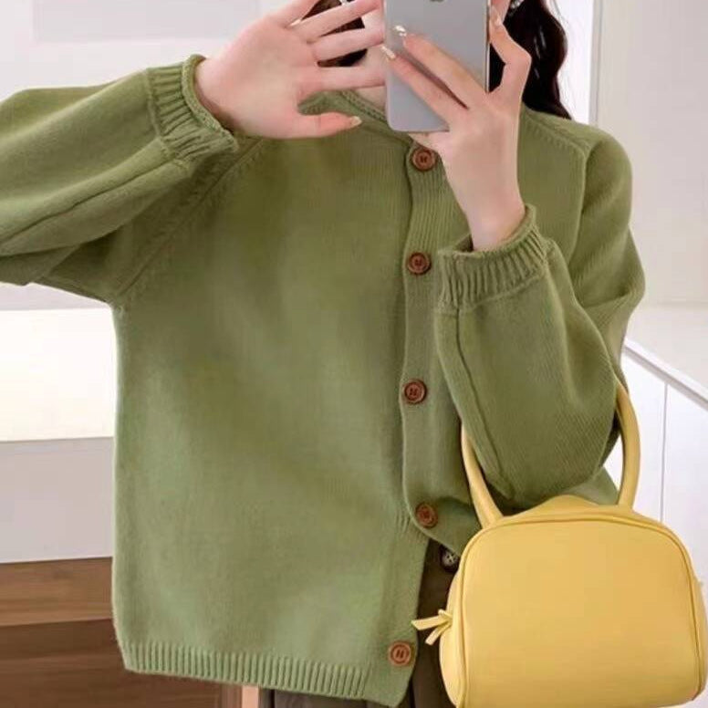 Women's cardigan with asymmetrical cut and generous balloon sleeves NOVAE