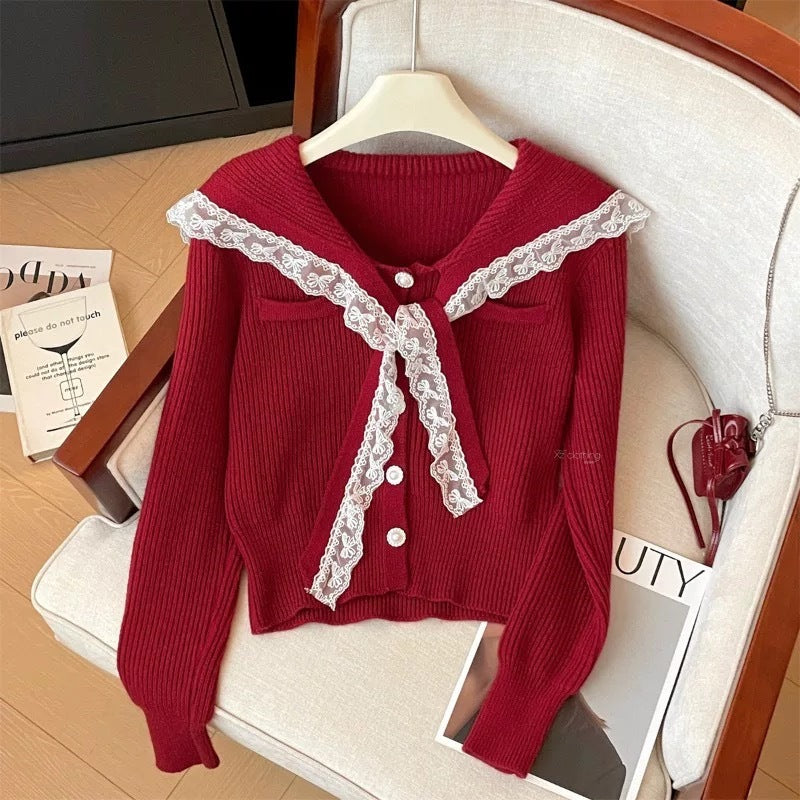 Women's cardigan with ruffled neckband and decorative buttons NOVAE