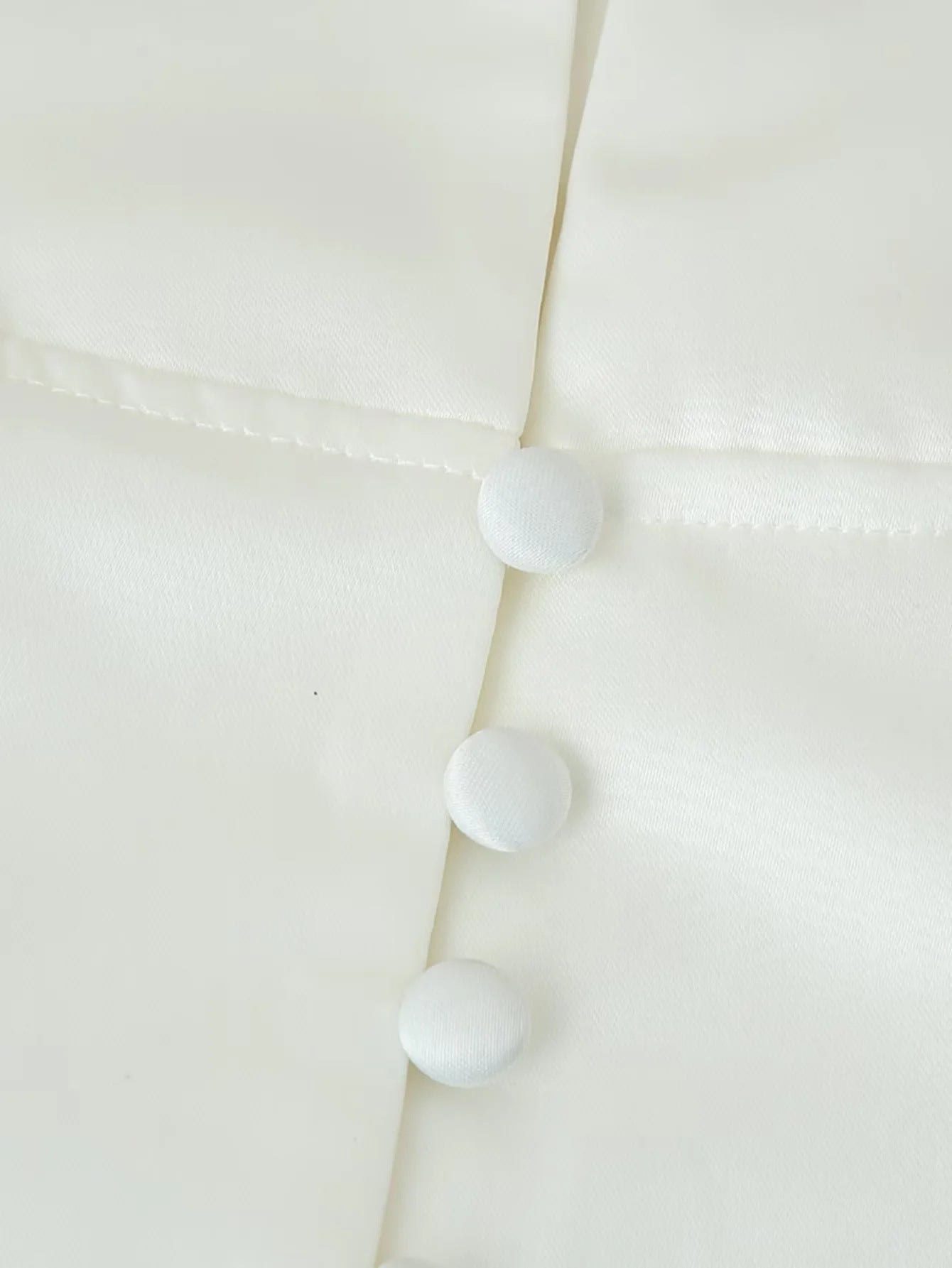 Women's fitted blouse with modern button details and stand-up collar NOVAE