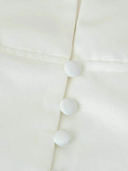 Women's fitted blouse with modern button details and stand-up collar NOVAE