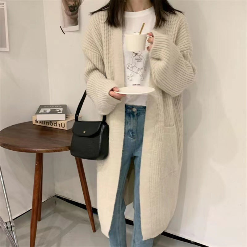 Women's knitted cardigan with a relaxed silhouette and deep pockets NOVAE