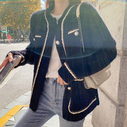 Women's fashionable cardigan with elegant contrast stitching and button details NOVAE