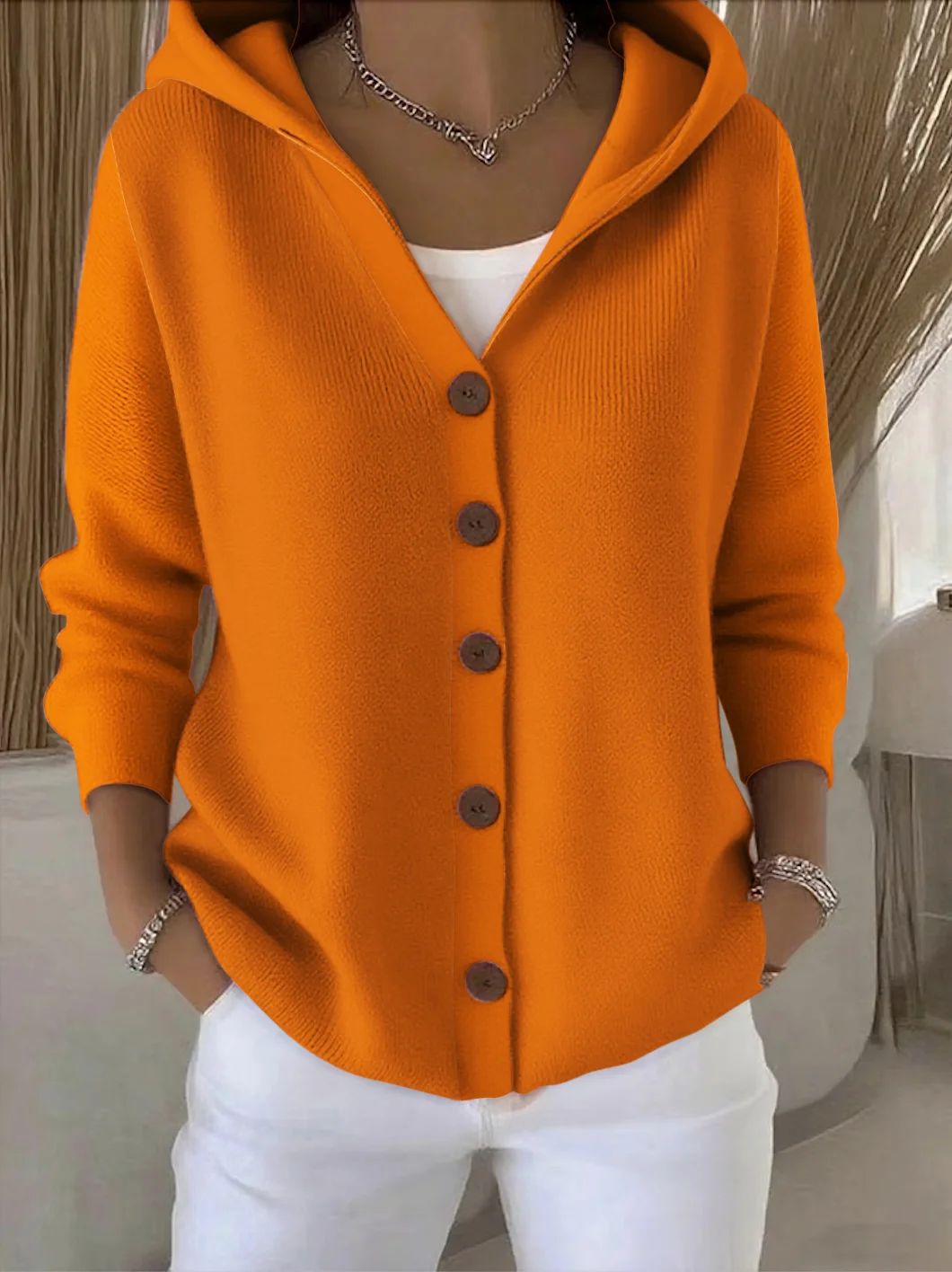 Women's hooded cardigan with practical button details and a relaxed fit NOVAE