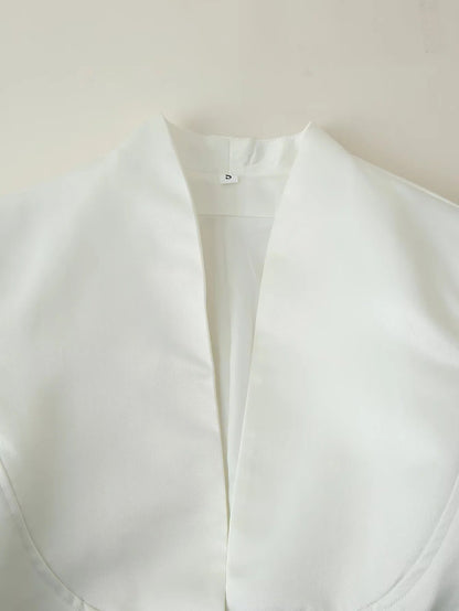 Women's fitted blouse with modern button details and stand-up collar NOVAE