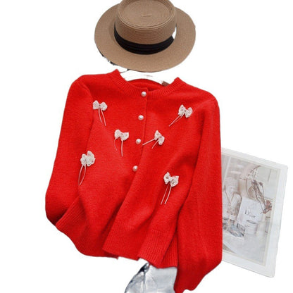 Women's cardigan with feminine appliqués and button details NOVAE