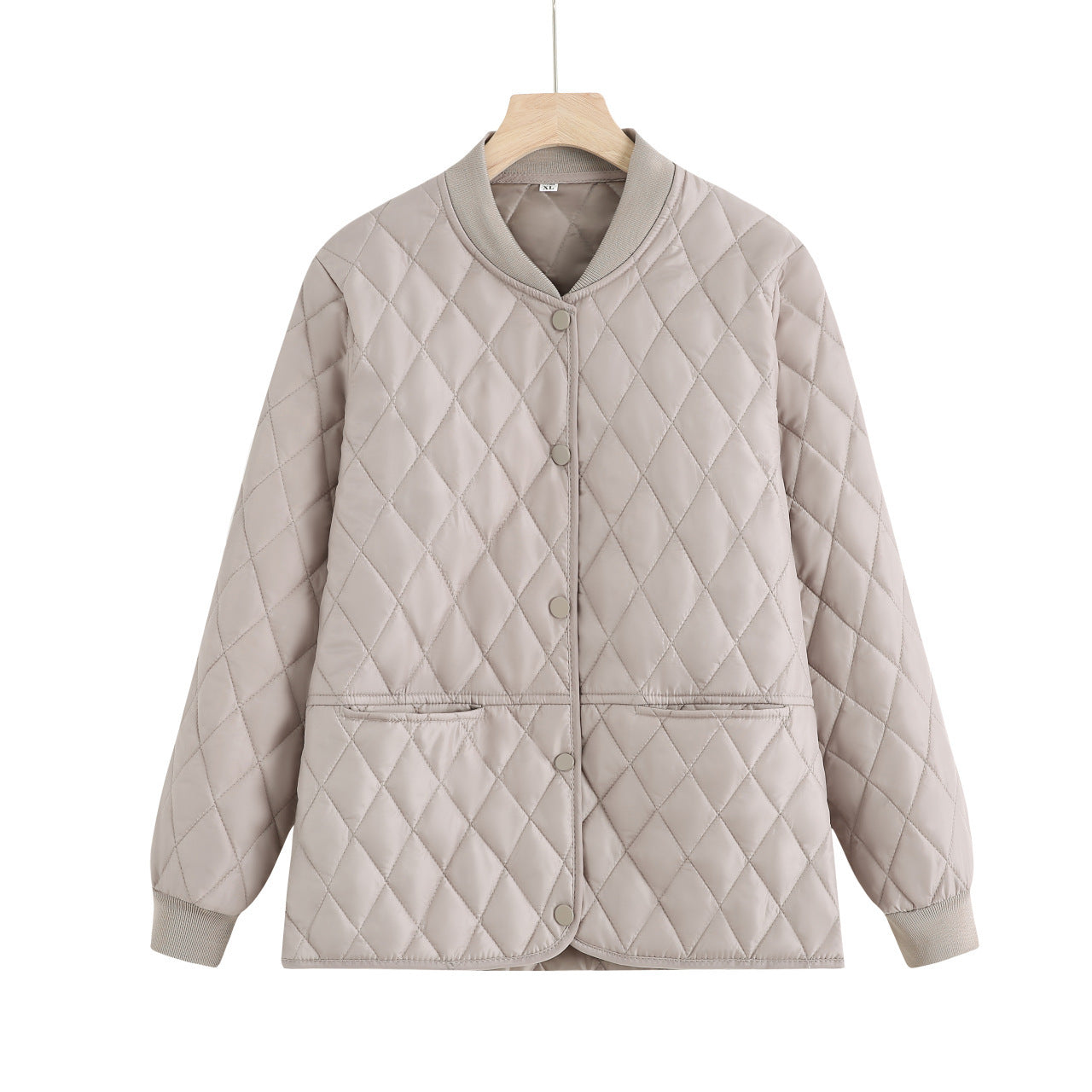 Women's quilted transitional jacket with practical pockets and a modern cut NOVAE