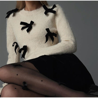 Women's knitted sweater with decorative bows NOVAE