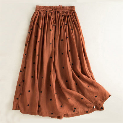 Women's long, airy skirt with elastic waistband and polka dot design NOVAE