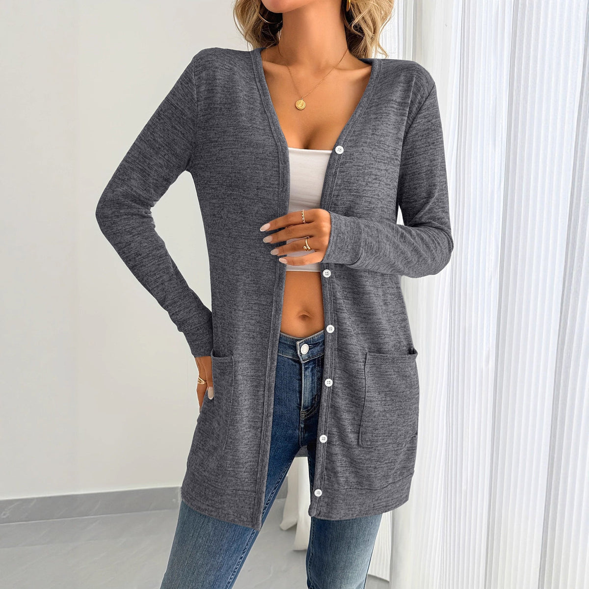 Women's long-sleeved cardigan with practical pockets and button placket NOVAE