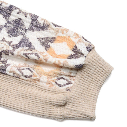 Women's knit sweater with modern raglan sleeves and floral pattern NOVAE