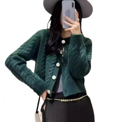 Women's chunky knit cardigan with decorative buttons and special cable pattern NOVAE