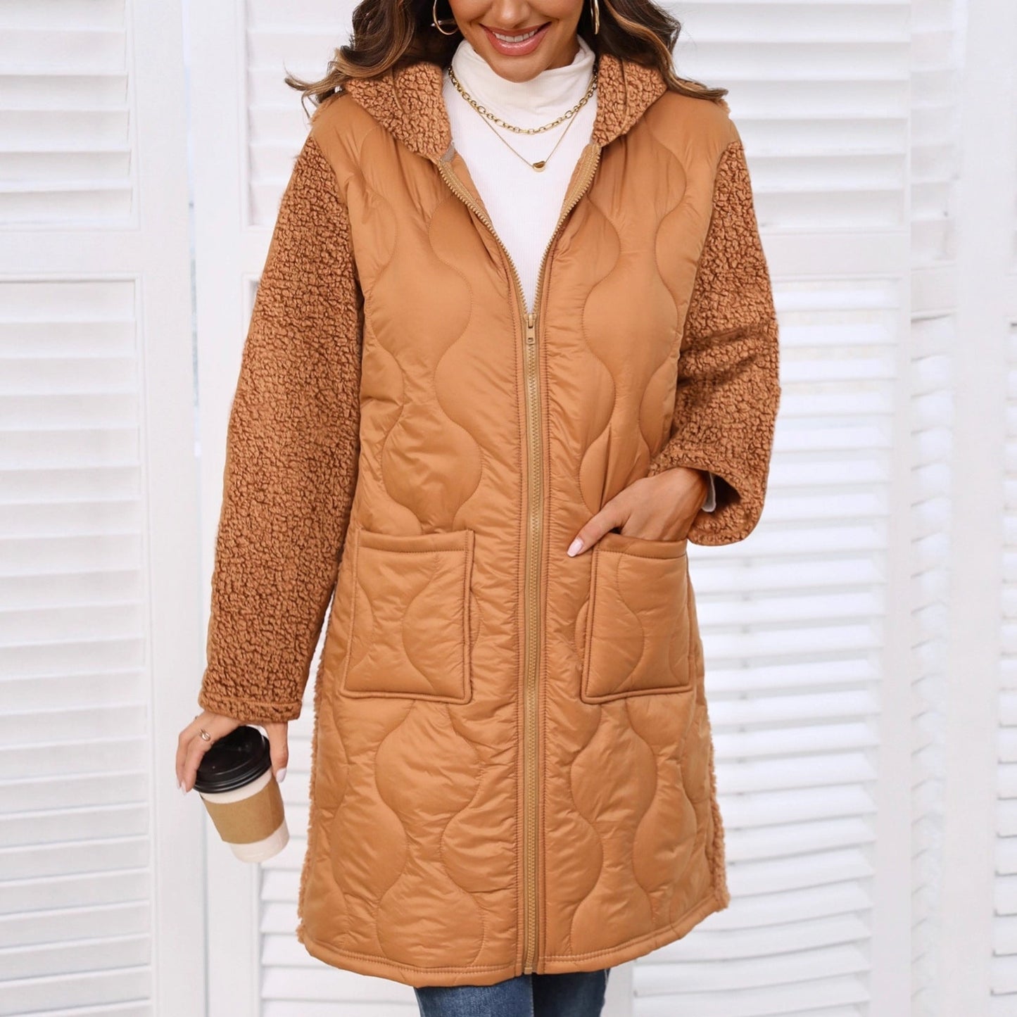 Women's long jacket with teddy-like lining and practical pockets NOVAE