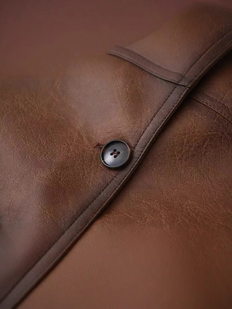 Women's cropped leather jacket with practical chest pockets and button details NOVAE