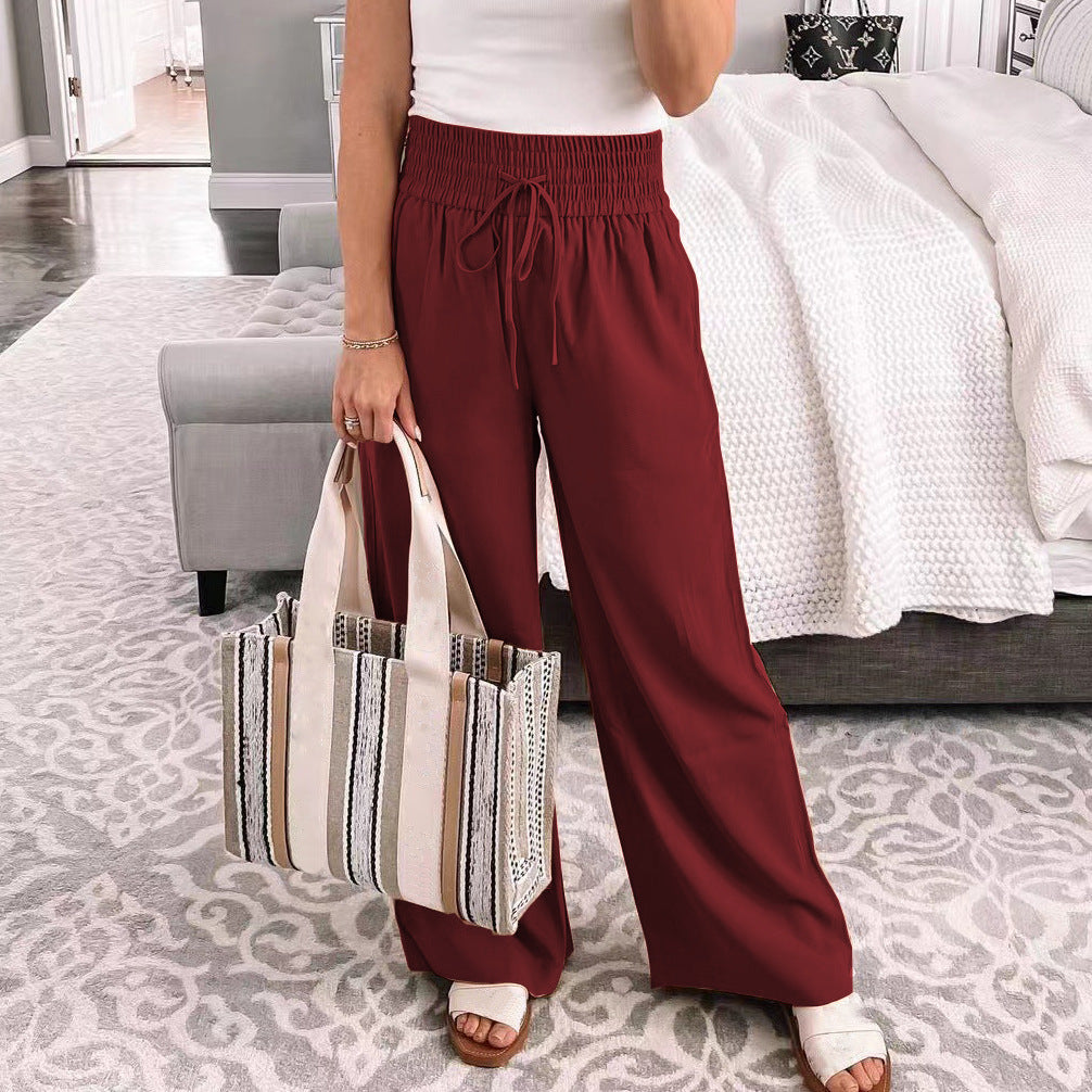 Women's wide-leg palazzo trousers with elasticated waistband and practical pockets NOVAE