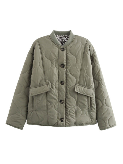 Women's quilted transitional jacket with practical pockets and round neckline NOVAE